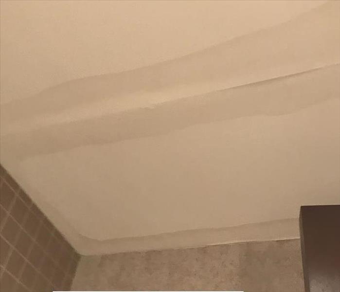 Ceiling with water damage stains