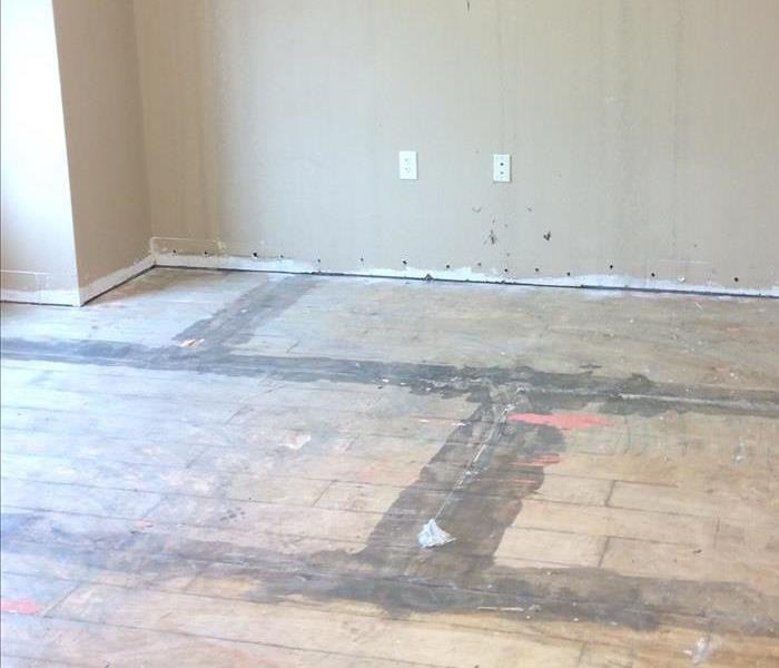 Removed flooring after drying leaving concrete exposed