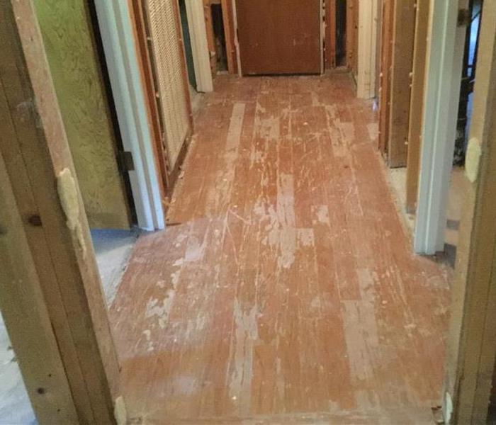 Hallway after laminate flooring removal